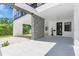 Spacious carport featuring modern tile flooring, stylish stone accents, and ample parking space at 3175 10Th N Ave, St Petersburg, FL 33713