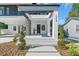 Inviting front porch with stone accents, modern design, and well-maintained landscaping at 3175 10Th N Ave, St Petersburg, FL 33713