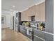 Sleek kitchen features stainless steel appliances, stone countertops, and modern light wood and black cabinetry at 3175 10Th N Ave, St Petersburg, FL 33713