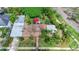 Stunning aerial view of a single-story home with lush tropical landscaping and an inviting entrance walkway at 3501 S Drexel Ave, Tampa, FL 33629