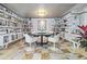 This dining area has shelving and beautiful marble floors at 3501 S Drexel Ave, Tampa, FL 33629