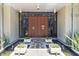 Inviting front entrance with water feature and modern double doors at 3501 S Drexel Ave, Tampa, FL 33629