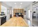 Well-lit kitchen with stainless steel appliances and a large island at 3501 S Drexel Ave, Tampa, FL 33629