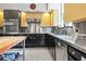 Bright kitchen featuring stainless steel countertops and appliances at 3501 S Drexel Ave, Tampa, FL 33629