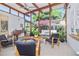 Bright living room featuring high ceilings, modern furnishings and garden views at 3501 S Drexel Ave, Tampa, FL 33629