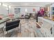 Spacious living room showcasing the tile flooring, modern art, and stylish decor at 3501 S Drexel Ave, Tampa, FL 33629
