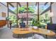 Bright living room featuring high ceilings, modern furnishings and garden views at 3501 S Drexel Ave, Tampa, FL 33629