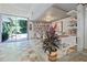 Stylish living room with seamless indoor-outdoor flow and abundant natural light at 3501 S Drexel Ave, Tampa, FL 33629