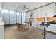 Bright office space with built-in storage, glass table, and abundant natural light at 3501 S Drexel Ave, Tampa, FL 33629