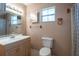 Bathroom with a single sink vanity and medicine cabinet at 3823 N 56Th St, Tampa, FL 33619