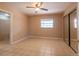 Bedroom with tile flooring and a sliding door closet at 3823 N 56Th St, Tampa, FL 33619