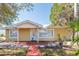Charming single-story home featuring a well-maintained front yard and inviting entrance at 3823 N 56Th St, Tampa, FL 33619
