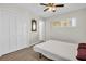 Bedroom with closet, ceiling fan and vinyl flooring at 4725 Cove Cir # 601, St Petersburg, FL 33708