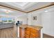 Inviting kitchen with a breakfast bar seamlessly flows into the living area at 4725 Cove Cir # 601, St Petersburg, FL 33708