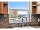 Kitchen sink with a view of the city and waterfront, featuring granite countertops at 4725 Cove Cir # 601, St Petersburg, FL 33708