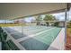 Community shuffleboard courts with seating, shelter, and bay views at 4725 Cove Cir # 601, St Petersburg, FL 33708