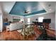 Spacious living room features a bar area, gaming console, home gym, and media center at 4997 W Breeze Cir, Palm Harbor, FL 34683