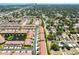 An aerial view of the community's neighborhood, showcasing lush landscaping and neat rows of homes at 5276 6Th N Way, St Petersburg, FL 33703