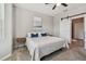 Inviting bedroom showcasing a sliding barn door and light filled interior at 5276 6Th N Way, St Petersburg, FL 33703
