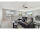 Upstairs bonus room featuring plush carpeting, a ceiling fan, and plenty of windows at 5276 6Th N Way, St Petersburg, FL 33703