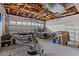 Spacious garage with high ceilings, work area, and ample storage, perfect for hobbies or projects at 543 Crystal Dr, Madeira Beach, FL 33708