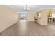 A spacious living room featuring new flooring, neutral walls, and an open floorplan at 543 Crystal Dr, Madeira Beach, FL 33708