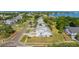 Aerial view of waterfront townhomes near the beach with views of the bay at 581 Oceanview Ave, Palm Harbor, FL 34683
