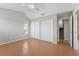 Bright bedroom with vaulted ceilings, neutral walls, tile floors, and a double closet at 581 Oceanview Ave, Palm Harbor, FL 34683