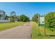 Scenic neighborhood street with well-maintained lawns and sidewalks at 581 Oceanview Ave, Palm Harbor, FL 34683