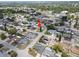 An aerial view of the property, showing its location within a vibrant residential area at 5821 Thrush Dr, New Port Richey, FL 34652