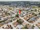 A bird's eye view of the home, nestled within a lush, established neighborhood at 5821 Thrush Dr, New Port Richey, FL 34652