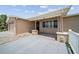 Inviting front entrance with stone pillars, modern lighting, and an arched front door, enhancing curb appeal at 5821 Thrush Dr, New Port Richey, FL 34652
