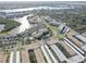 A stunning aerial view of the condo community, nestled beside serene lakes and featuring meticulously kept grounds at 6330 99Th N Way # 14F, St Petersburg, FL 33708