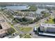 Gorgeous aerial view of waterfront condos with mature trees and lush landscaping at 6330 99Th N Way # 14F, St Petersburg, FL 33708