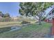 The backyard showcases serene water views and lush greenery, creating a private outdoor retreat at 6330 99Th N Way # 14F, St Petersburg, FL 33708