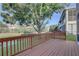 Wooden deck offering scenic views of the community's landscaping and provides a perfect spot for outdoor enjoyment at 6330 99Th N Way # 14F, St Petersburg, FL 33708