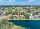 Waterfront property featuring solar panels and a screened lanai with stunning views at 709 47Th E St, Bradenton, FL 34208