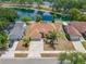 Beautiful home with an inviting backyard overlooking a serene lake, complete with a wooden deck at 709 47Th E St, Bradenton, FL 34208