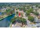 Scenic waterfront property with well-maintained landscaping and serene canal views at 709 47Th E St, Bradenton, FL 34208