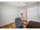 Bright bedroom view featuring wood floors and a wall closet at 709 47Th E St, Bradenton, FL 34208