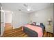 Comfortable bedroom featuring wood floors and a closet at 709 47Th E St, Bradenton, FL 34208