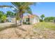 Charming single-story home features a well-maintained yard, a two-car garage and appealing curb appeal at 709 47Th E St, Bradenton, FL 34208