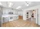 Bright kitchen boasting white cabinetry and stainless steel appliances at 709 47Th E St, Bradenton, FL 34208