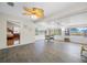 Open living area featuring a foosball table and multiple windows offering great natural light at 709 47Th E St, Bradenton, FL 34208