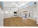 Bright, spacious living room with laminate flooring and high ceilings at 709 47Th E St, Bradenton, FL 34208