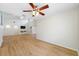 Spacious open floor plan with vaulted ceilings and wood-look floors at 709 47Th E St, Bradenton, FL 34208