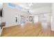 Spacious open-concept living room with beautiful laminate flooring and high ceilings at 709 47Th E St, Bradenton, FL 34208