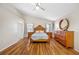 Spacious main bedroom featuring hardwood floors, vaulted ceilings, and ample space at 709 47Th E St, Bradenton, FL 34208