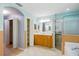 Bathroom with ample counter space, shower, and storage at 7310 Brightwater Oaks Dr, Tampa, FL 33625