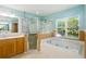Bathroom with soaking tub and shower at 7310 Brightwater Oaks Dr, Tampa, FL 33625